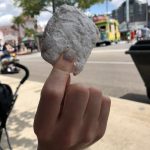 beignet covered in powdered sugar