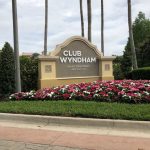 Club Wyndham Bonnet Creek entrance sign with flowers in front