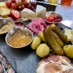 charcuterie on chalkboard plate