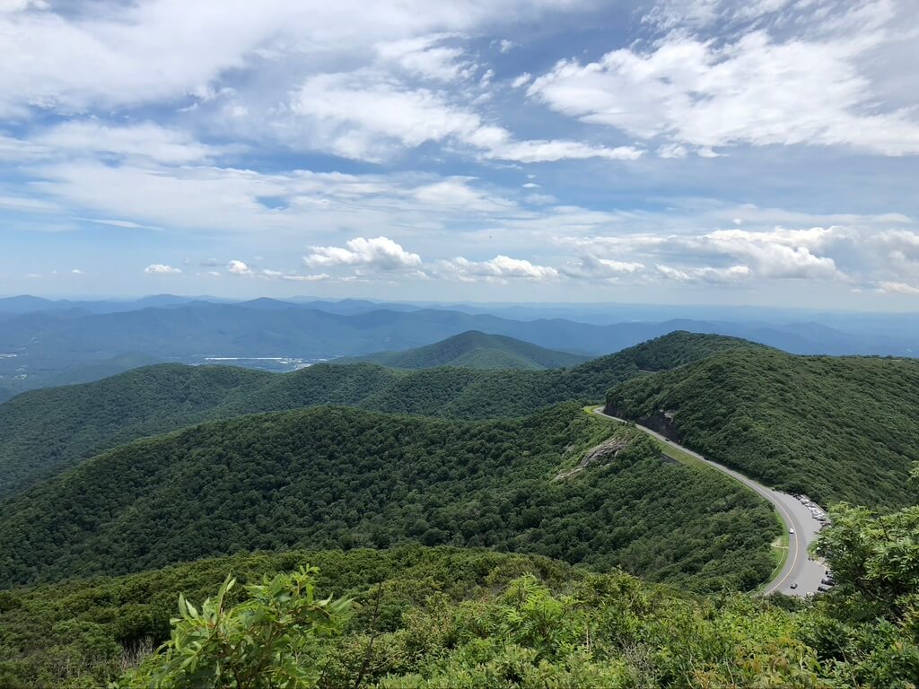 View of the Blue Ridge Parkway from the mountains. Take a photography tour in Asheville to learn how to take better photos.