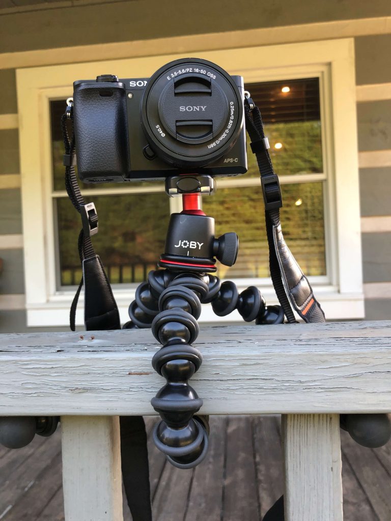 tripod wrapped around railing