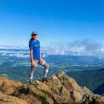 girl on top of rock formations - best hikes in Shenandoah