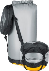 gray and yellow sea-to-summit dry back for camping, hiking, and watersports.