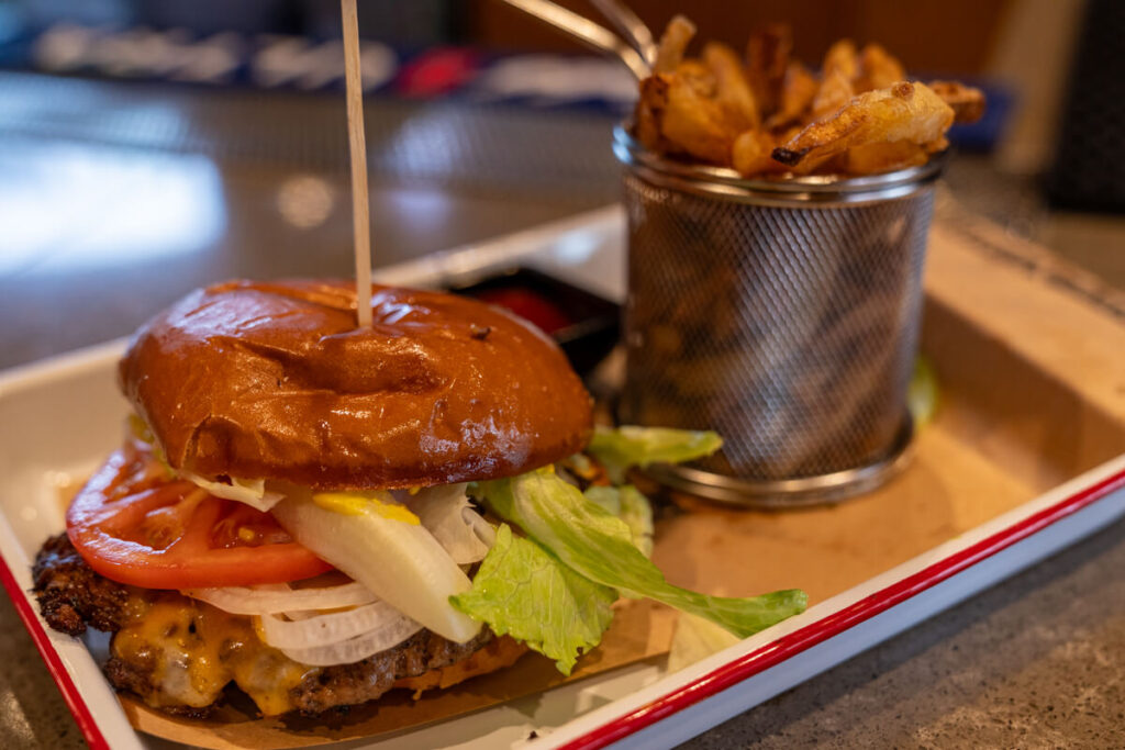 Smashburger with a tower of fries.