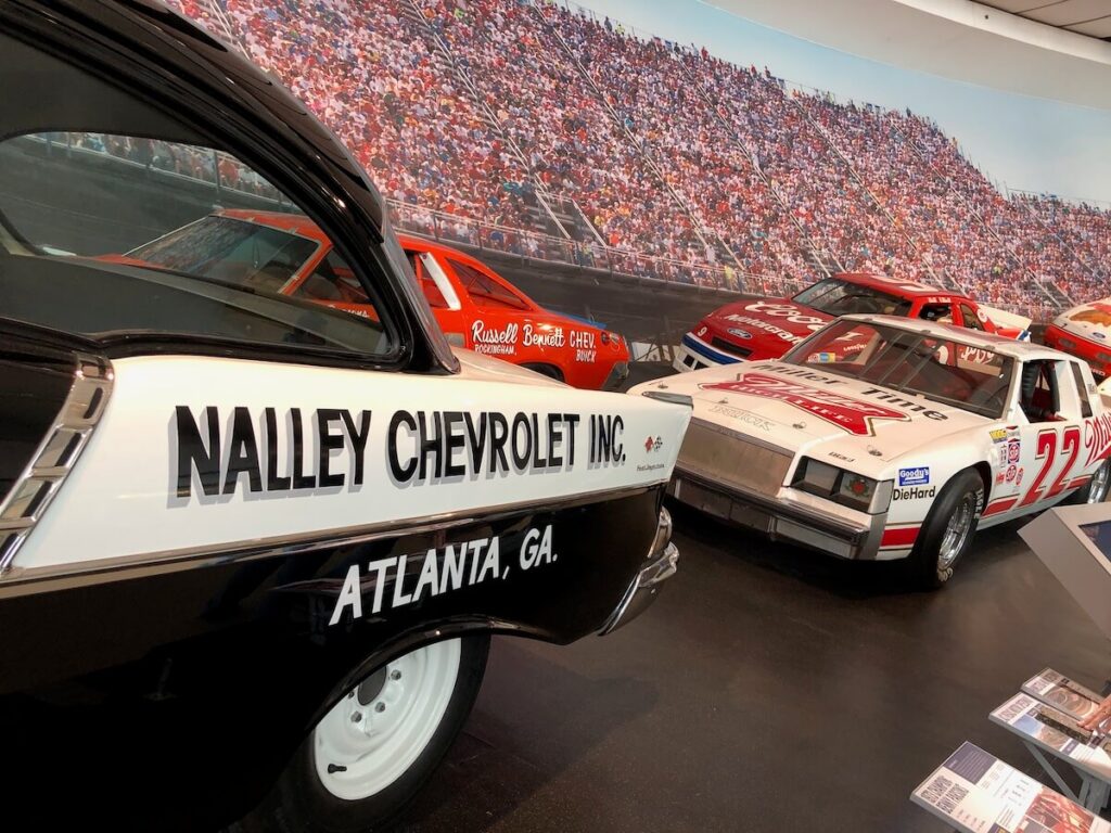 Restored NASCAR cars on Glory Road in the NASCAR Hall of Fame.