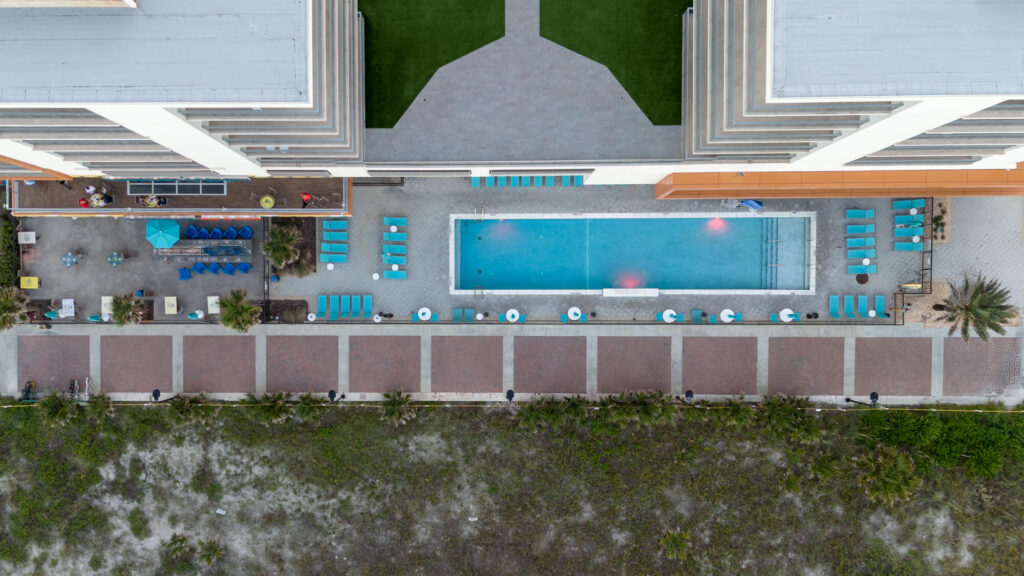 A top-down view of the pool at a Margaritaville hotel.