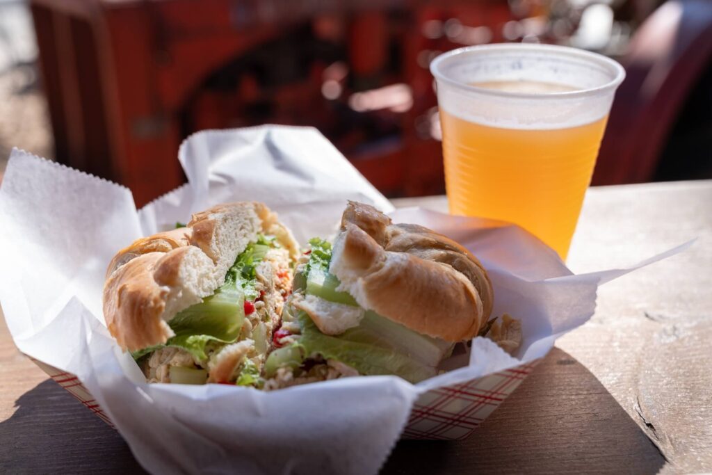 chicken salad sandwich and beer