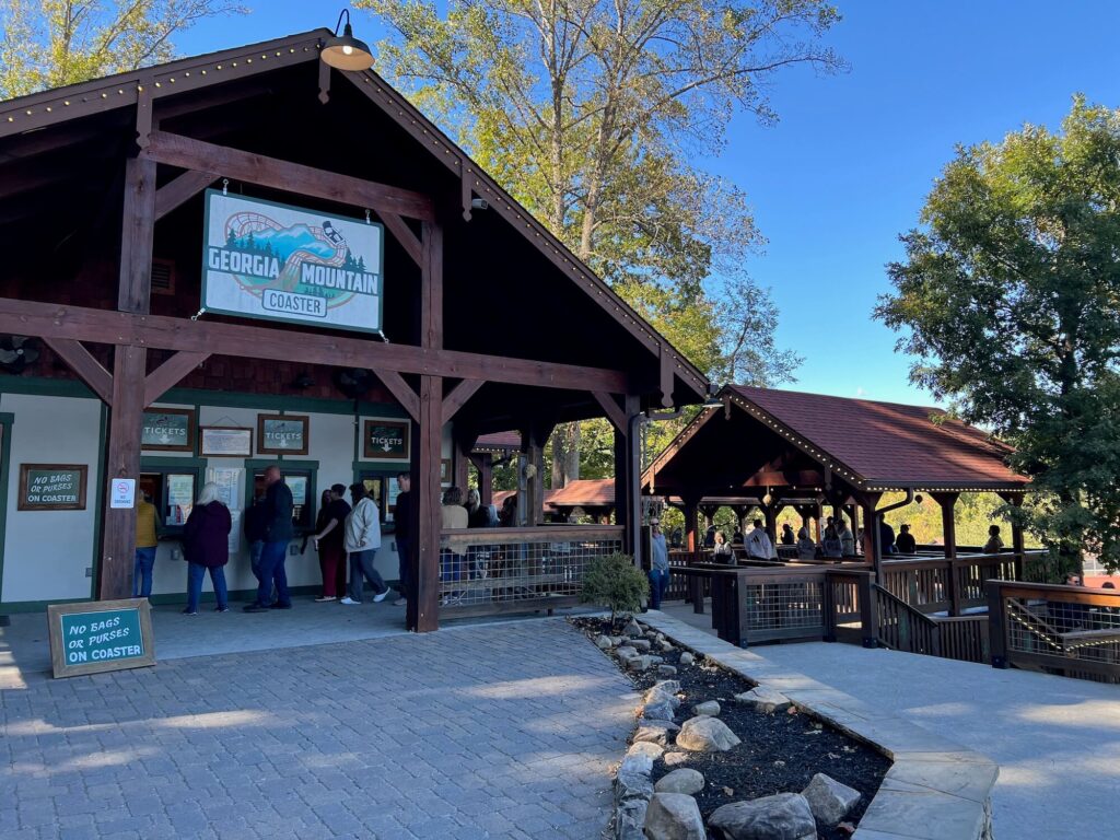 ticket office at the Georgia Mountain Coaster with line of people in front